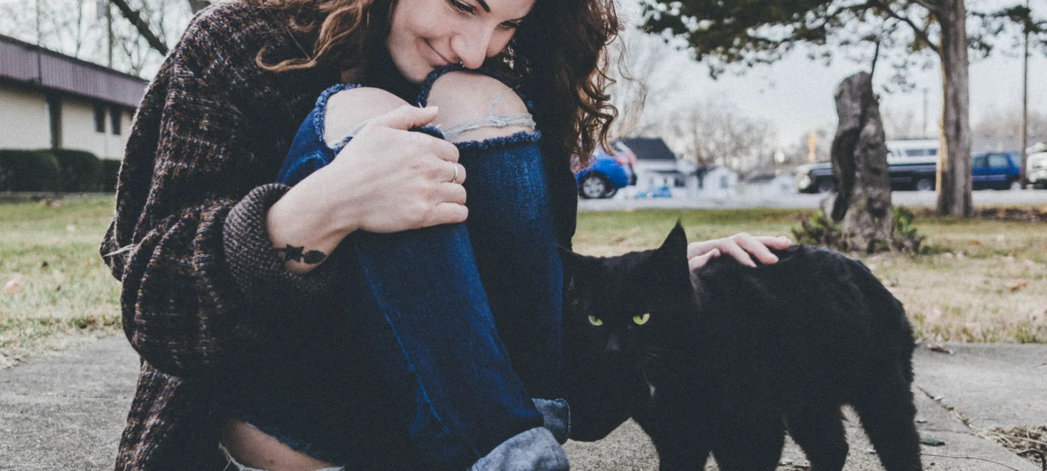 woman petting cat